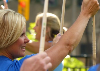 Manulife employees have fun with drumsticks